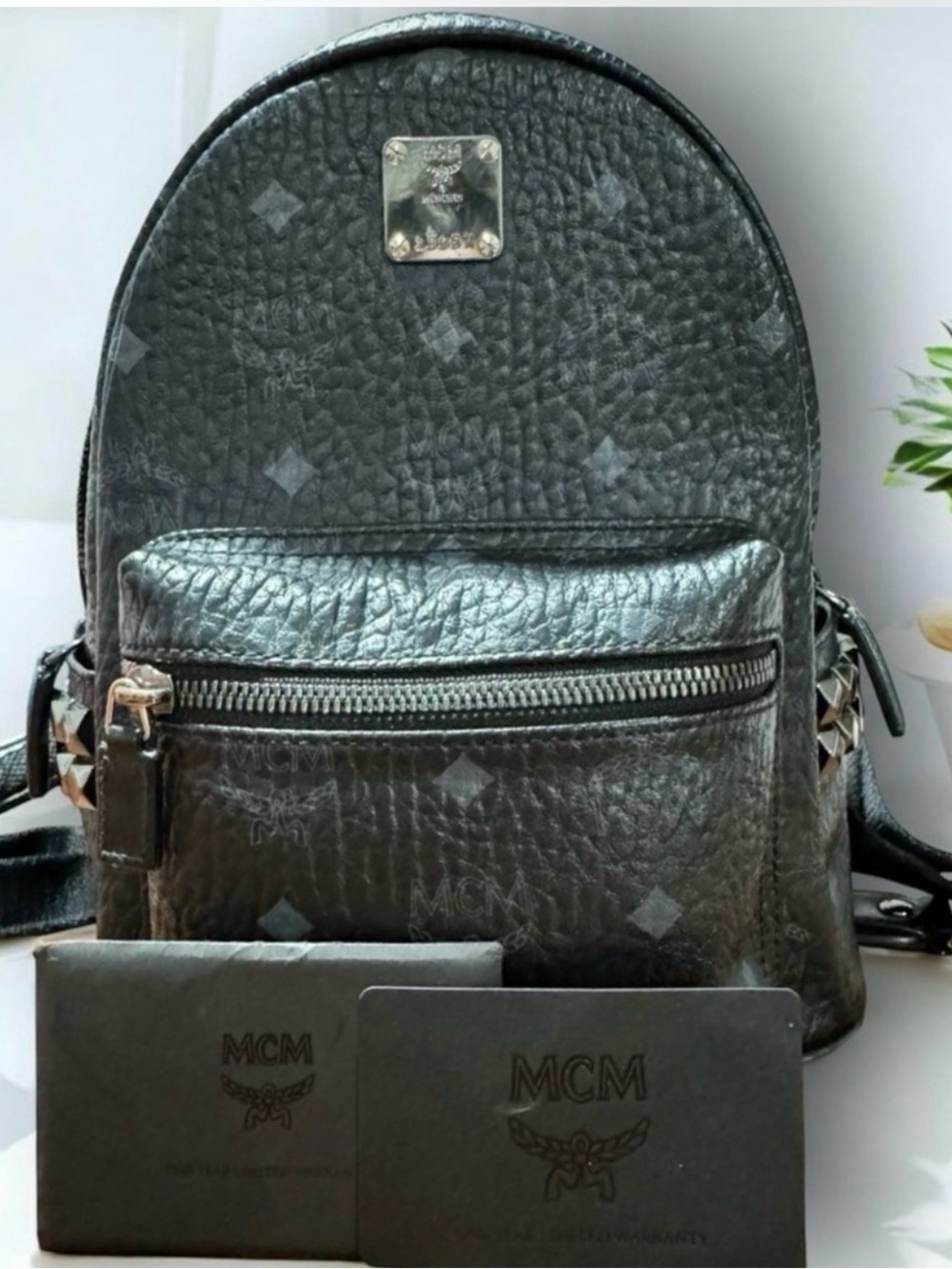 MCM Black Logo-Stamped Leather Mini Backpack with Stud Details